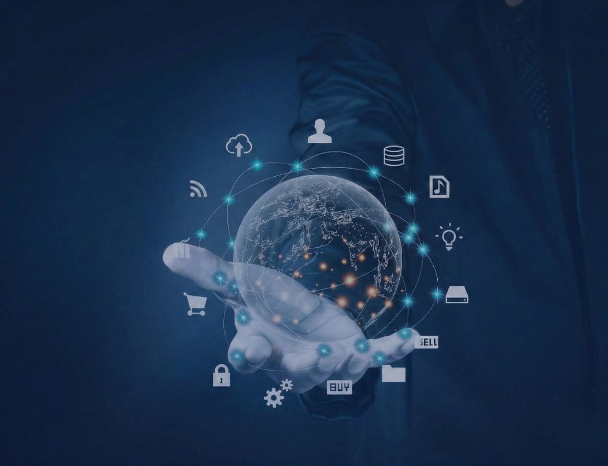 Hand holding a digital globe